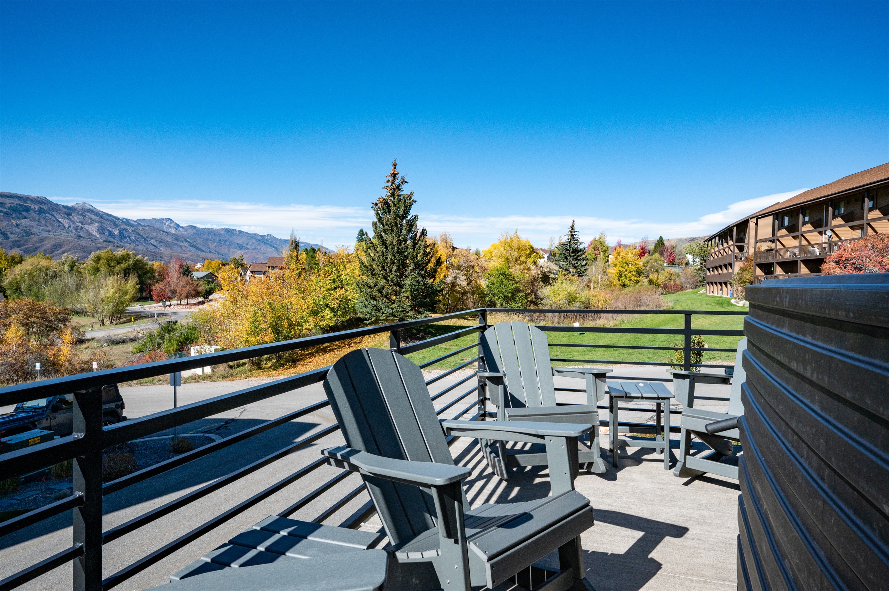 Private deck with comfortable seating and unobstructed mountain vistas.