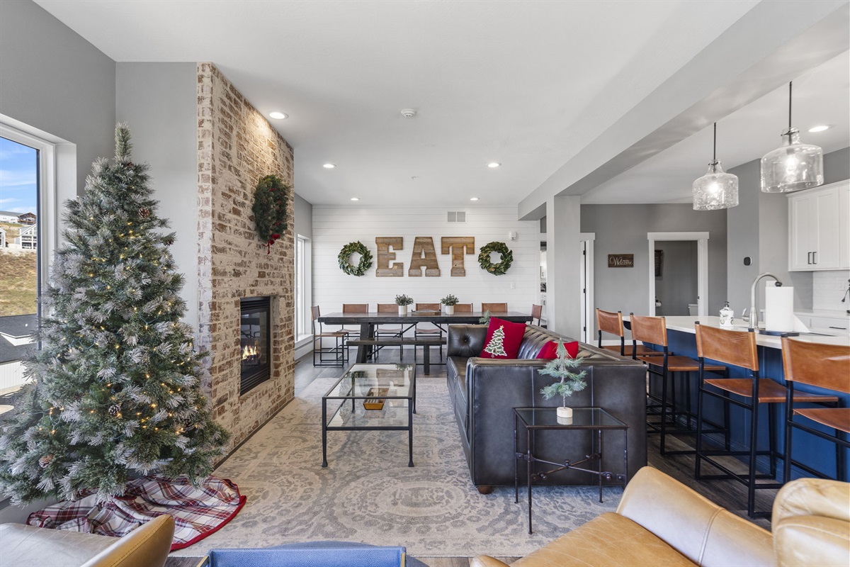 Open dining, kitchen, and living space on the main level. Main is ADA accessible