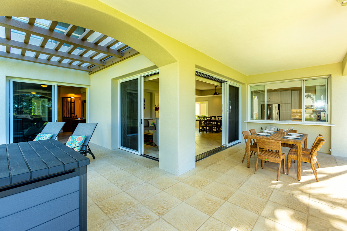 The 400 sq ft large lanai wraps around the living room. You have two chaise lounges, dining seating for six and a beach gear storage unit (contains beach chairs, boogie boards and a cooler)