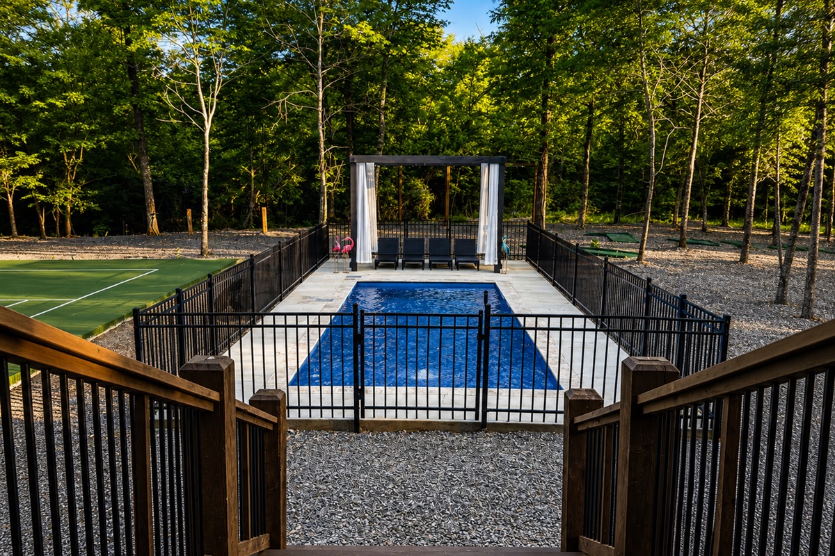 Outdoor Oasis: Dive into relaxation by the private pool amidst nature's tranquility!