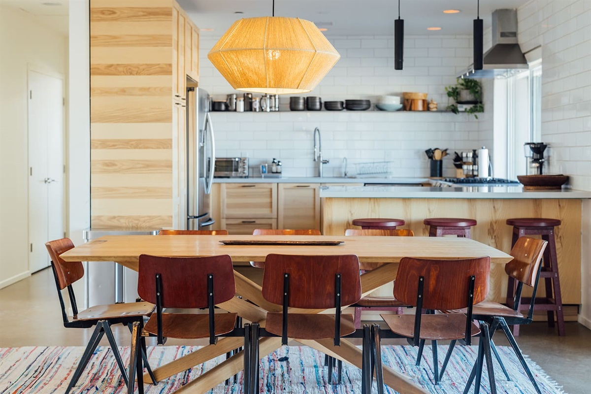 Open floor plan dining and kitchen areas with beautiful natural light.