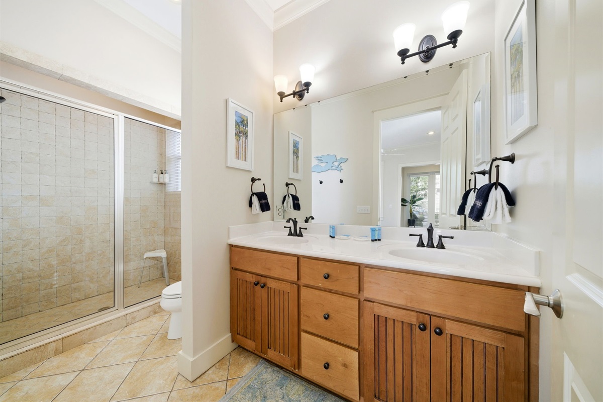 Enjoy the convenience of a private retreat with a large walk-in shower and plenty of storage in this spacious ensuite.