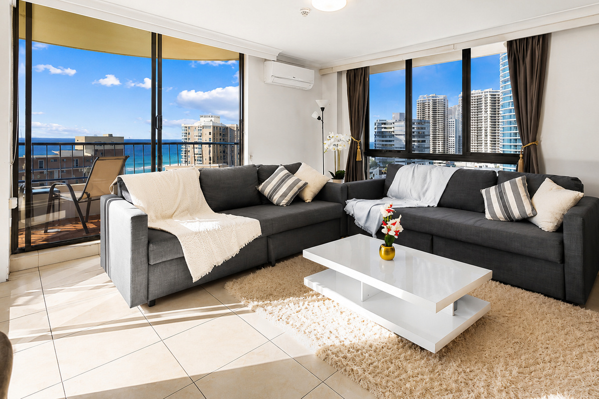 Set above Surfers Paradise, the living room brings ocean glimpses, city views and bright Gold Coast light into the apartment.
