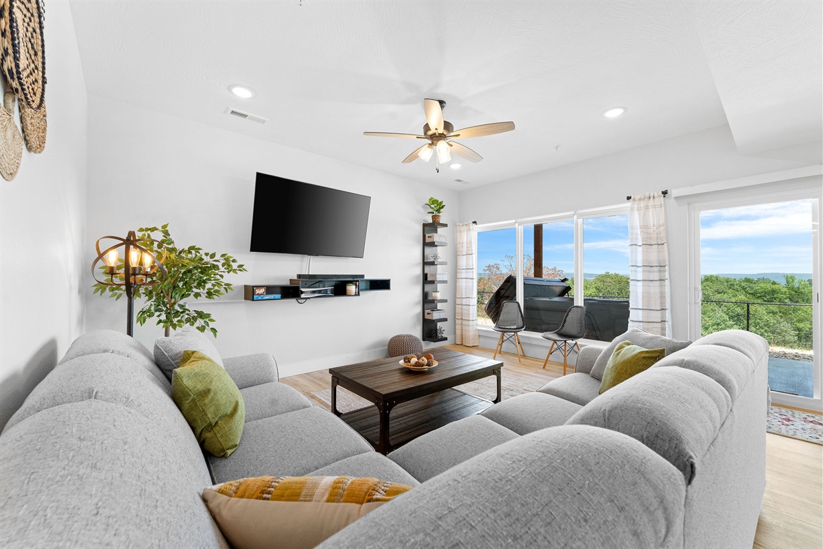 Lower level living room w/ sliding door to hot tub!