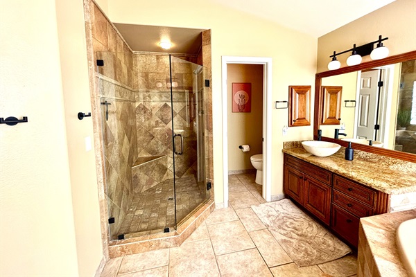 Primary Suite Bathroom with shower and bathtub