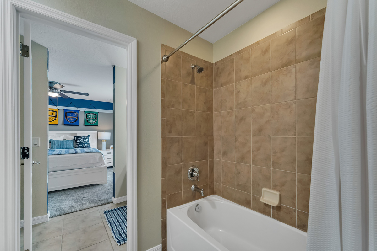 Shower / tub combo in Jack and Jill bathroom in between Harry Potter and Brave themed queen size rooms