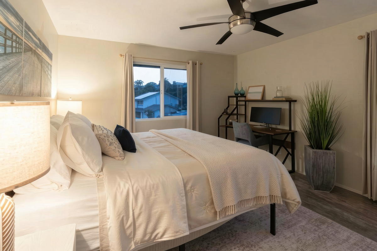 This upstairs king bedroom features private workspace. Entrance is through the other upstairs bedroom.