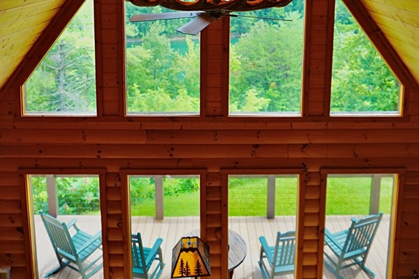 Great Room: Stunning views and rustic charm with a unique antler chandelier hanging above!