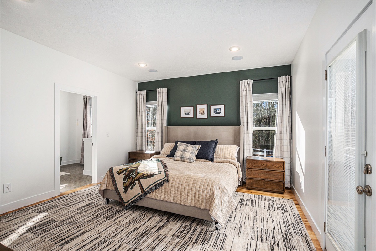 Blackout curtains, plush bedding, and thoughtful touches throughout.