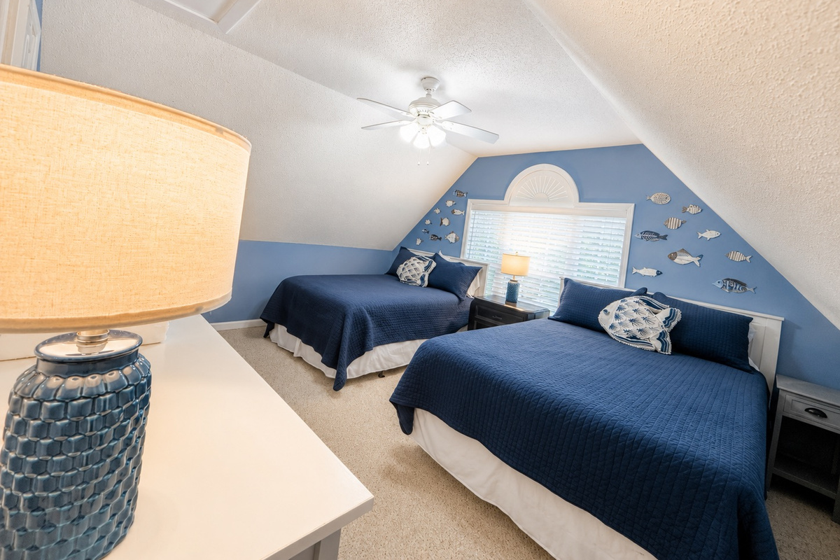 Spacious upstairs bedroom with relaxing ambiance