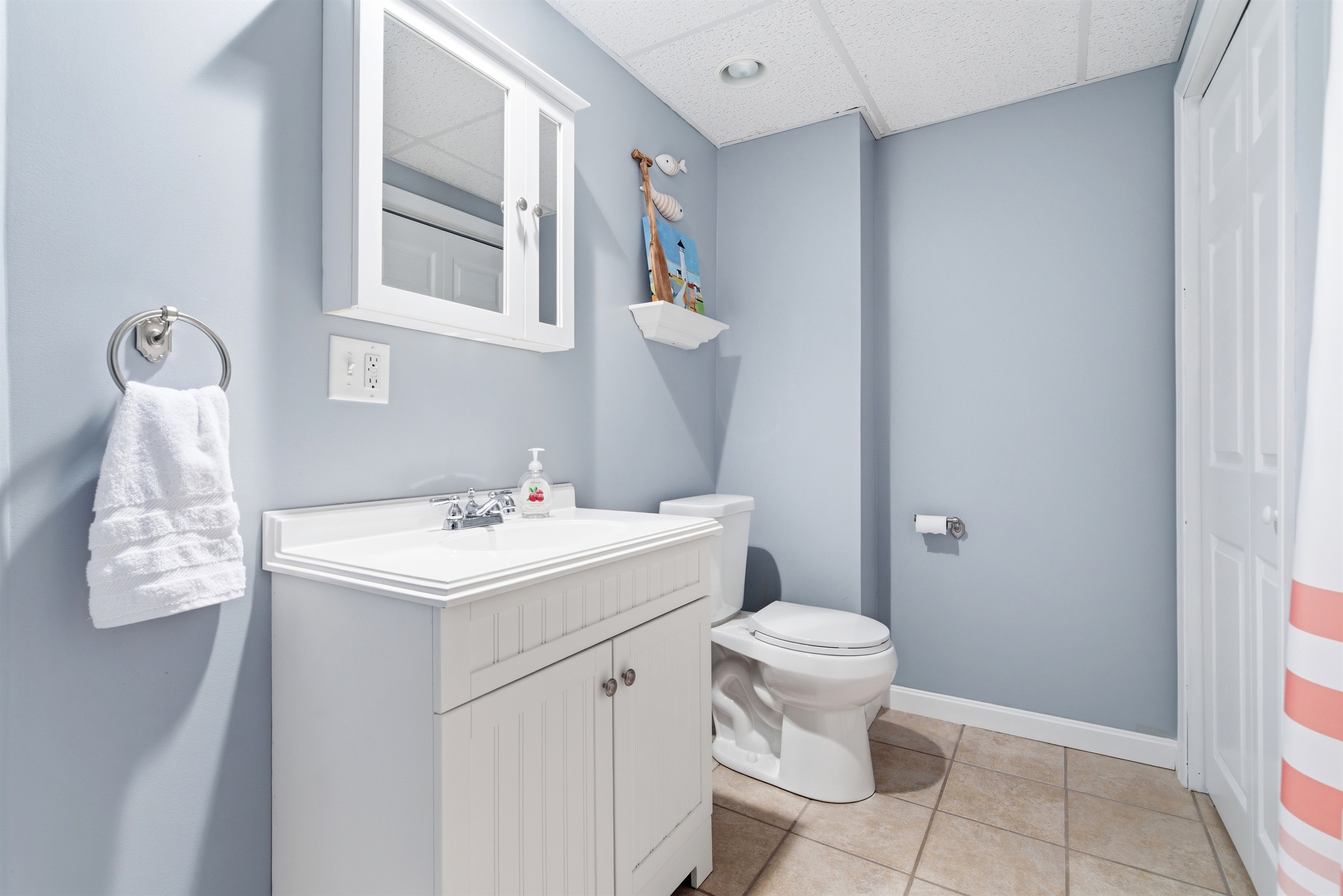 A clean and well-appointed bathroom designed for comfort and convenience, offering a fresh and relaxing space to unwind and refresh.