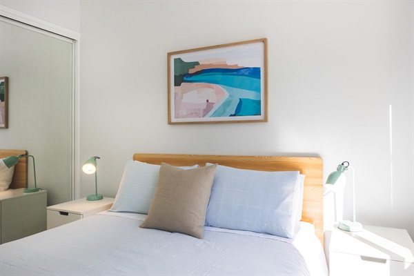 Bedroom One: Lots of space to unpack - built-in wardrobe & bedside tables.