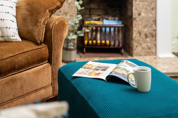Sit back and relax with a hot coffee and something good to read - the perfect quiet moment.