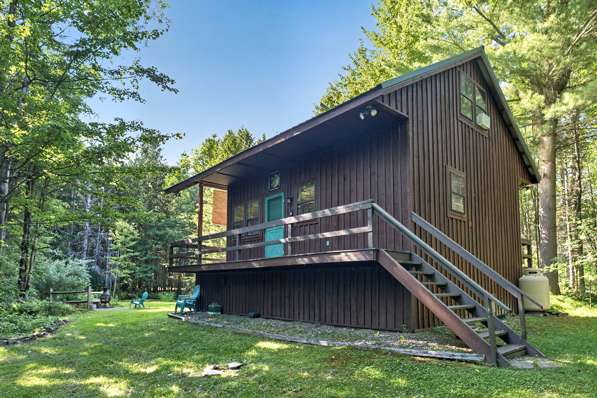 Side exterior with raised deck
