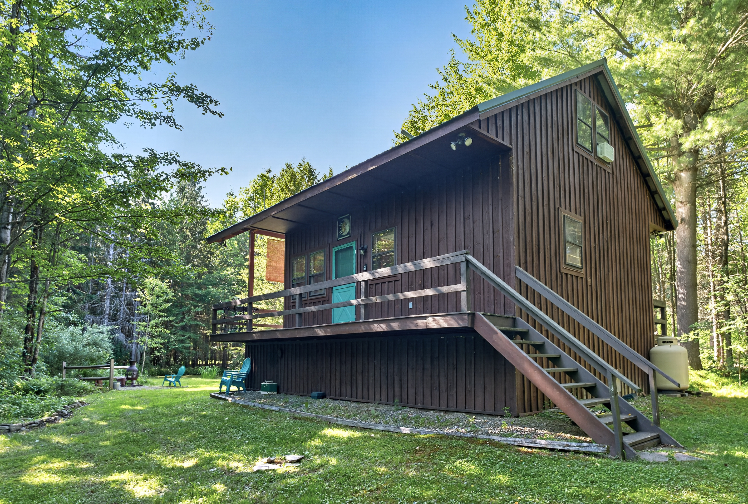 Side exterior with raised deck
