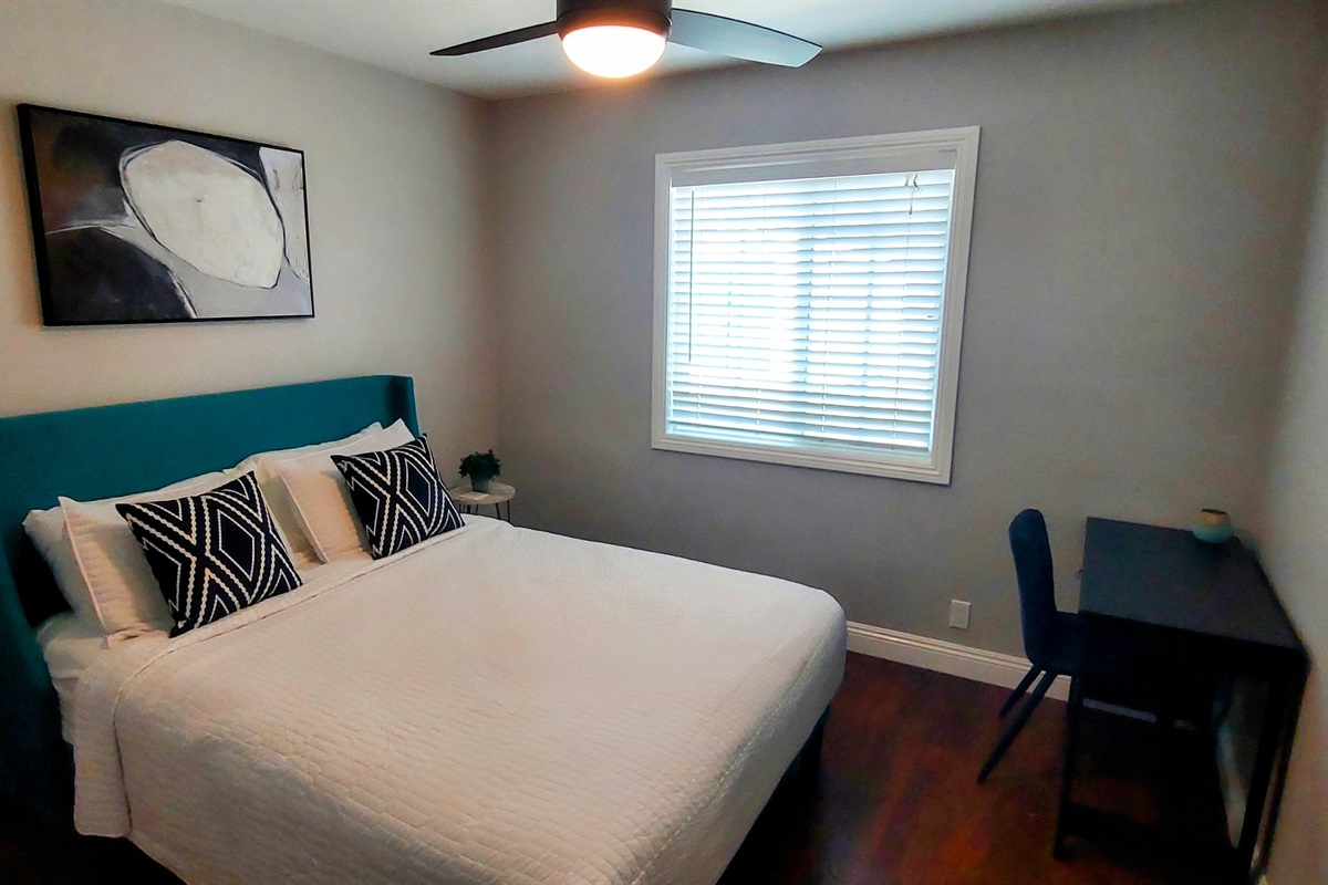 Bedroom #2 with Teal Bed and desk