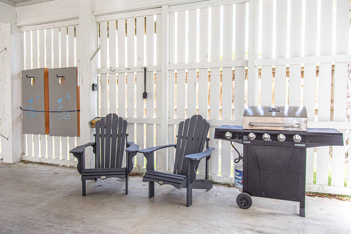 Propane grill, cornhome and a place to hang out in all the action