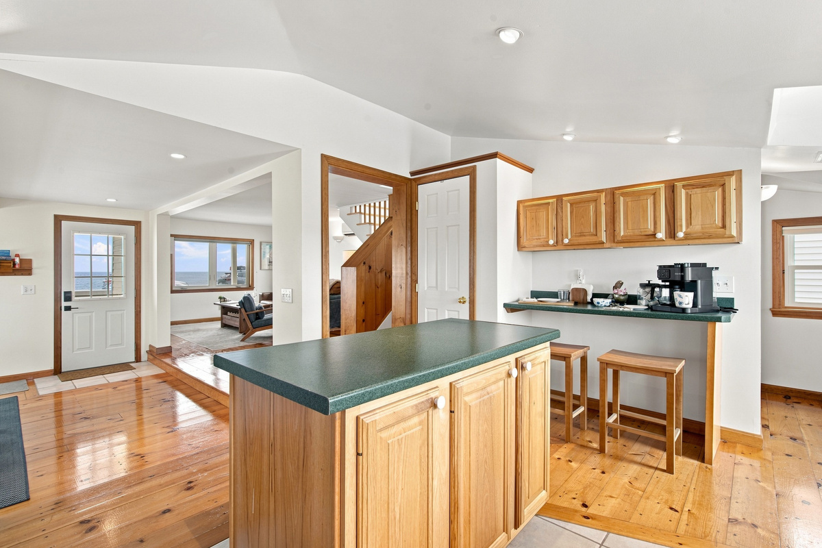Open-concept kitchen with an island, ample counter space, and easy access to the living area.