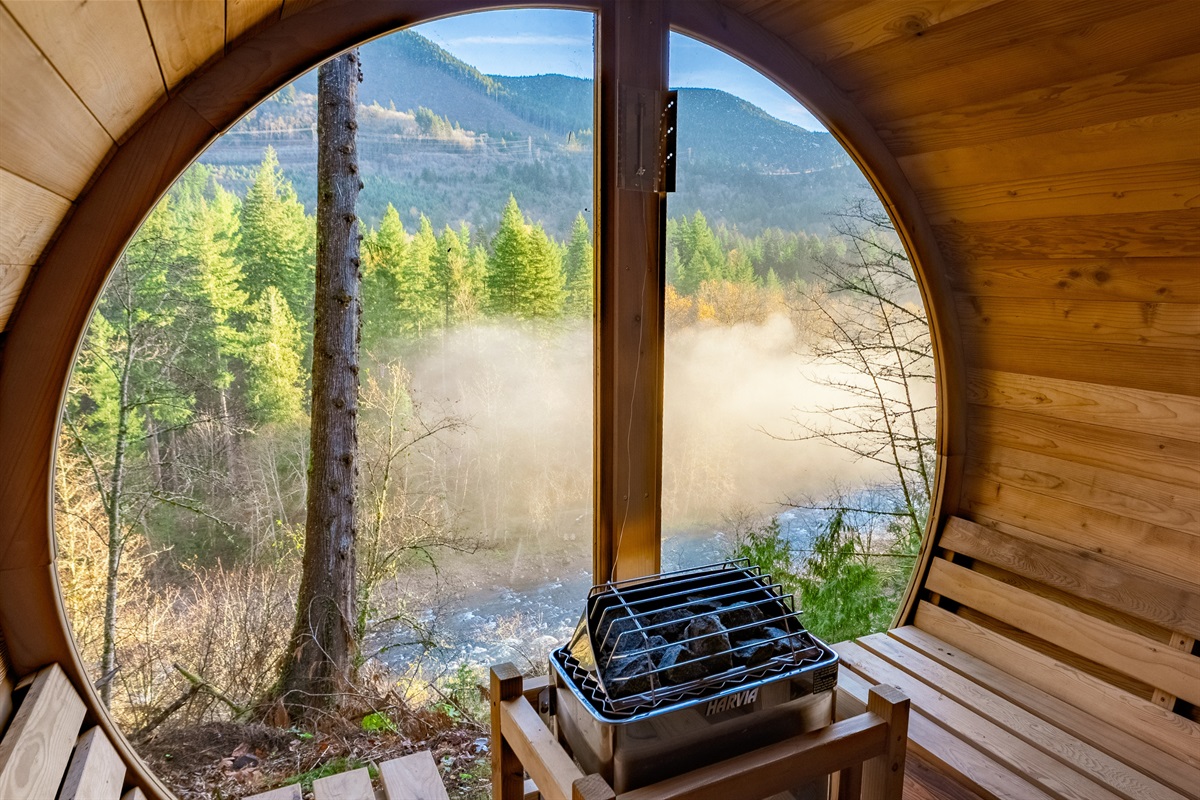 Unwind in the cedar sauna overlooking the river and mountains—your own quiet retreat where warm steam meets crisp alpine air.