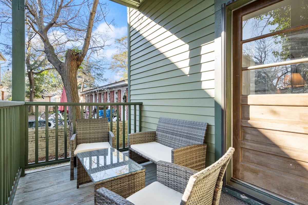 Your own front porch — sip your morning coffee and watch the Historic District wake up