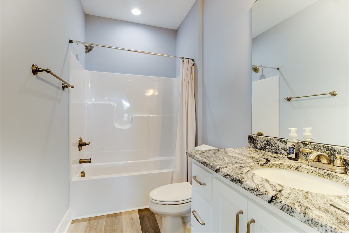 Clean, modern tub-shower combo&mdash;perfect for kids or quick rinses after the beach
