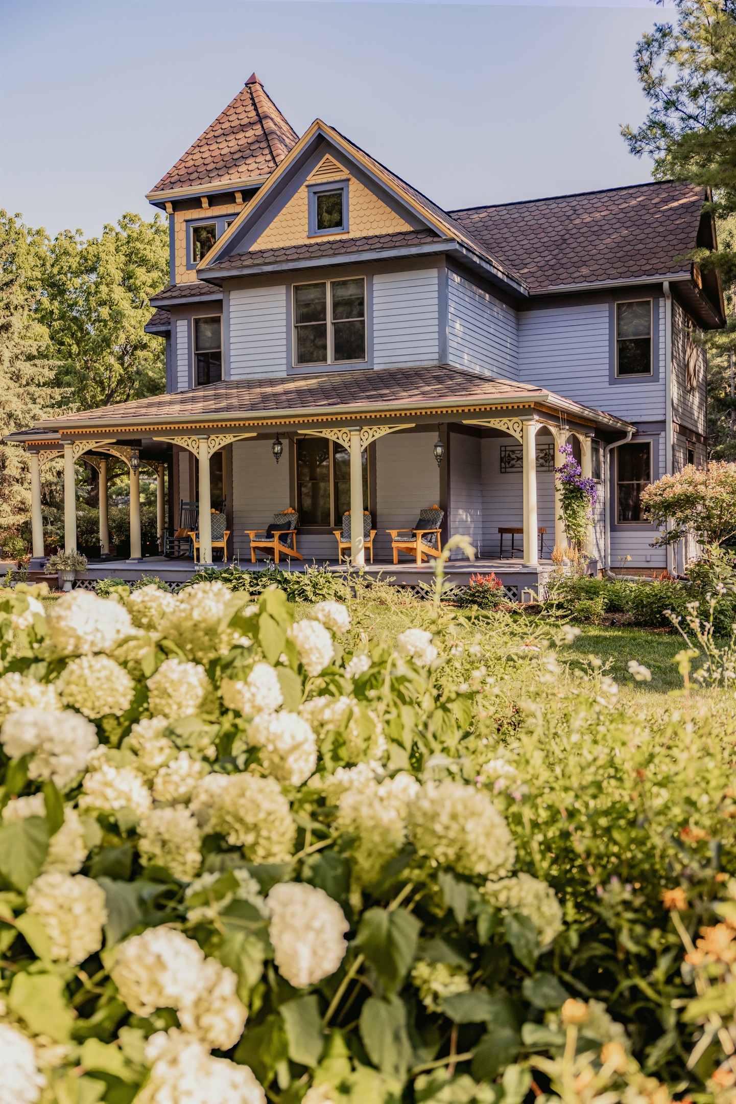 Enjoy vibrant blooms and peaceful garden paths, perfect for a relaxing stroll or morning coffee outdoors