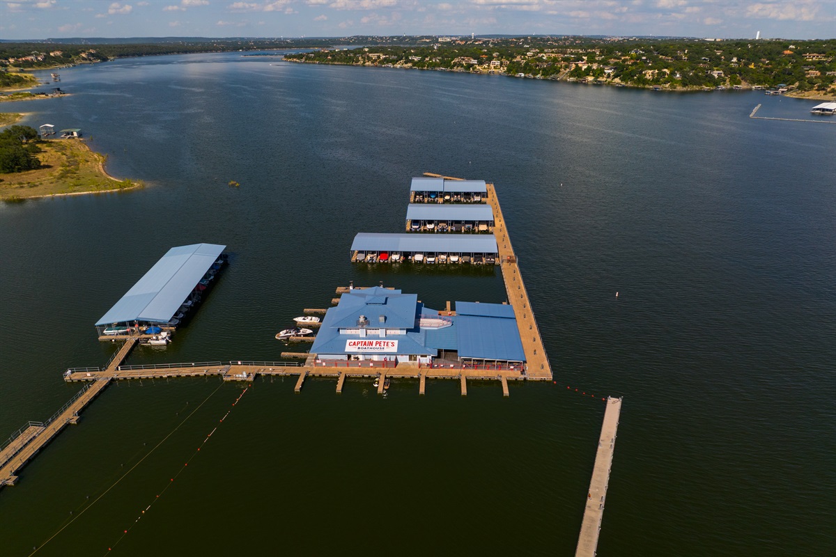 Floating restaurant and bar on Lake Travis with casual food, cold drinks, and live music on weekends.