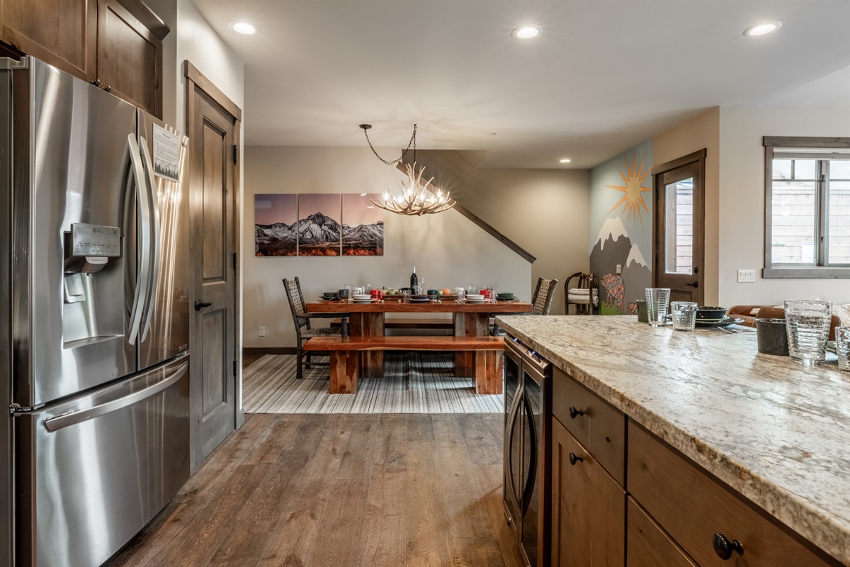 The seamless flow to the dining area keeps the chef connected to the conversation.