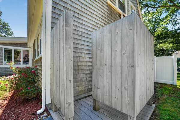 Private outdoor shower makes rinsing off after the beach quick and convenient.
