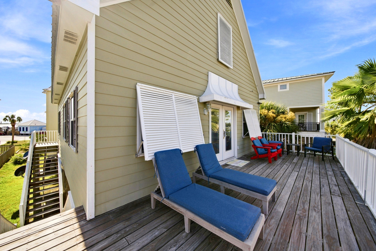 Another private deck invites you to relax outdoors, rain or shine.
