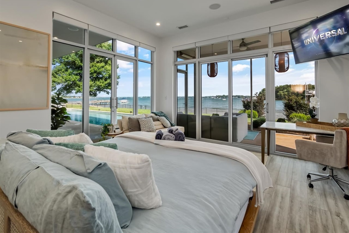 Master bedroom with attached screen porch overlooking Lake Norman and pool area.