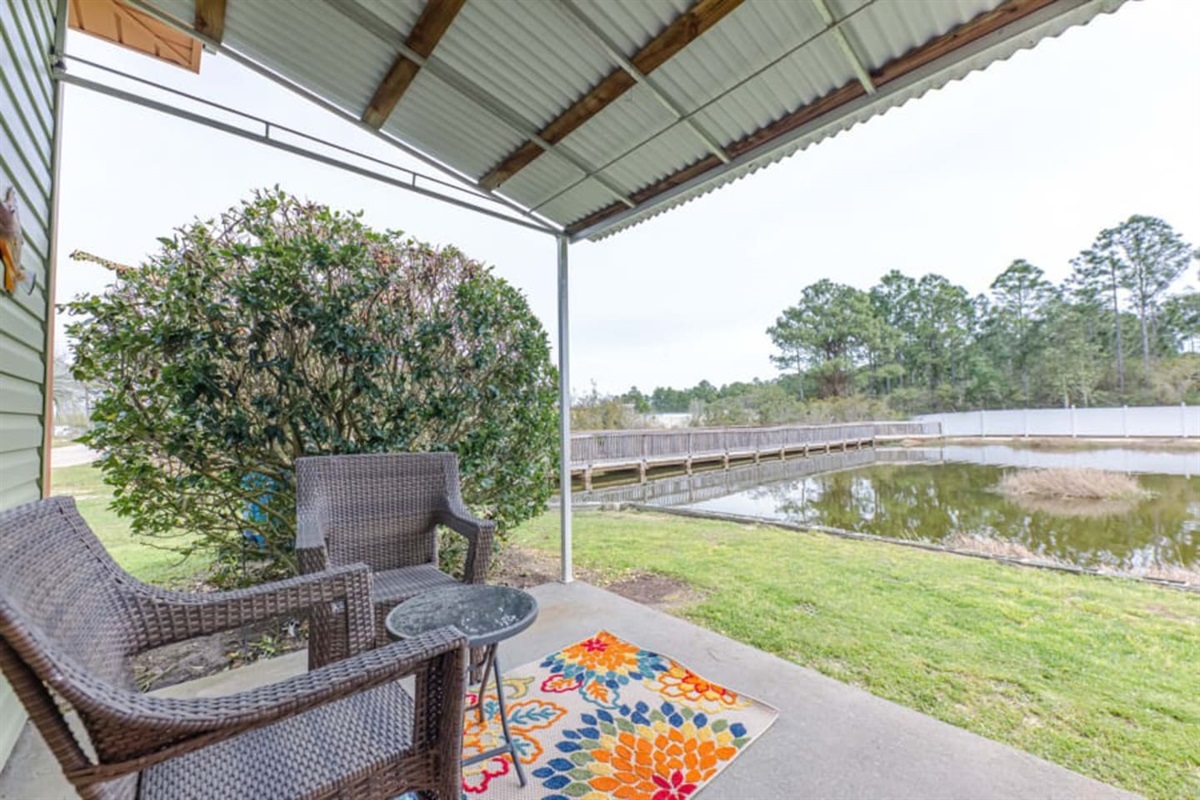 Outdoor Patio: Sip your morning coffee while enjoying serene pond views and fresh air!
