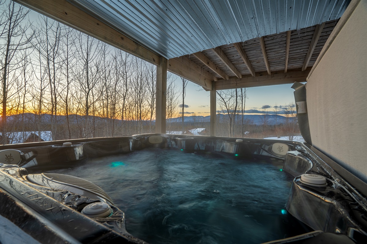 Your cozy mountain escape comes complete with a private hot tub!