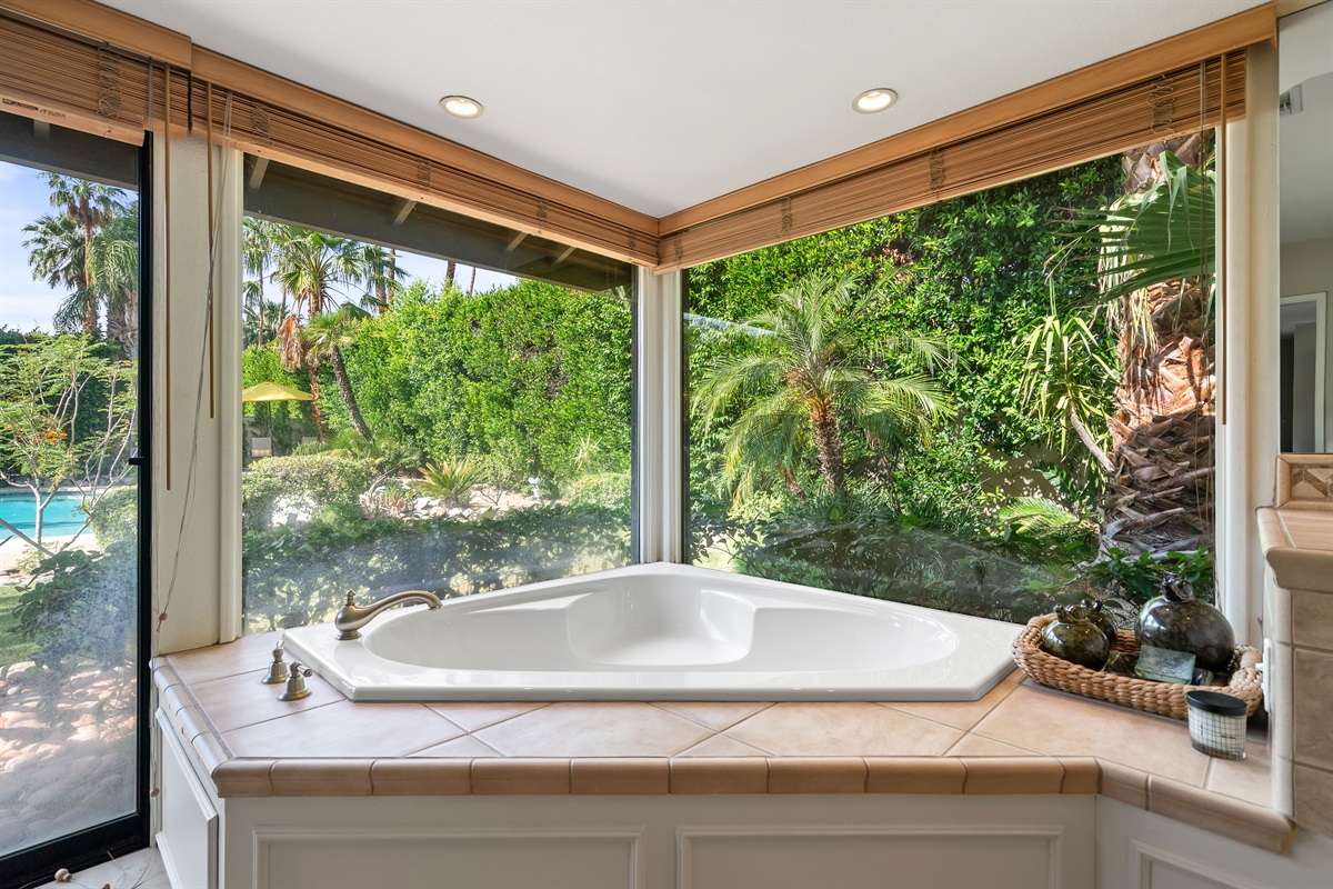 bathtub facing backyard