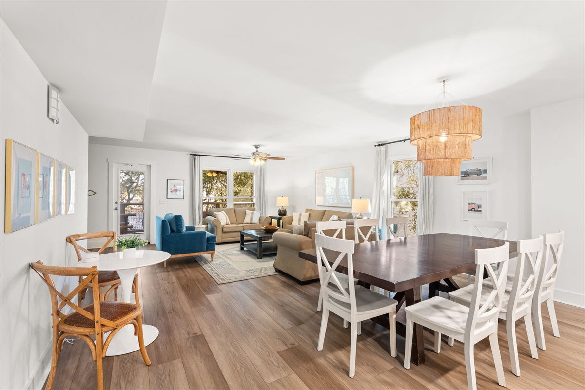 Side B: Large dining table with seating for the whole crew.