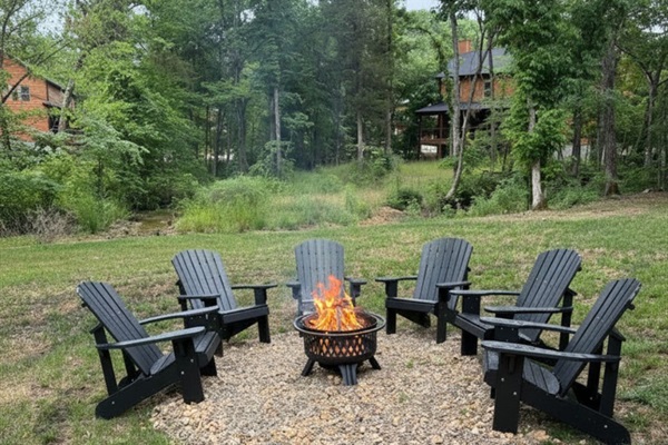 Brand new fire pit area located right off the back deck for your private use