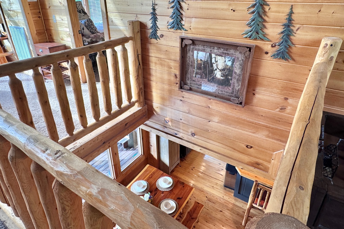 Unique cabin design, upper floor open to main level.