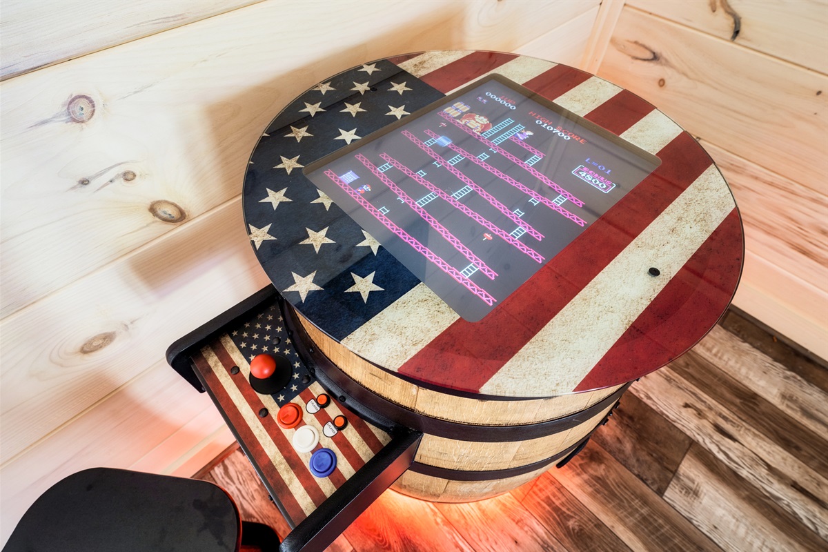 Show off your competitive skills w/ this old fashioned barrel arcade game.