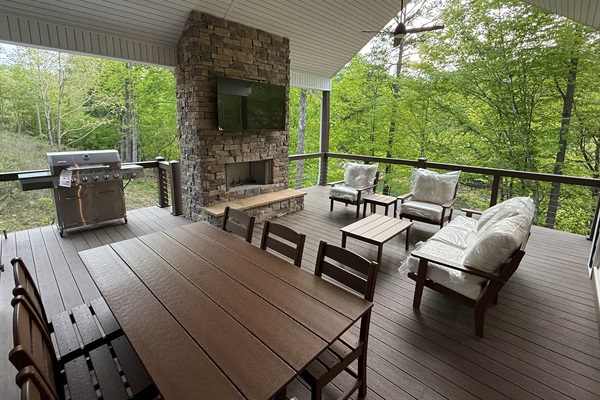 Upper level deck and wood burning fireplace