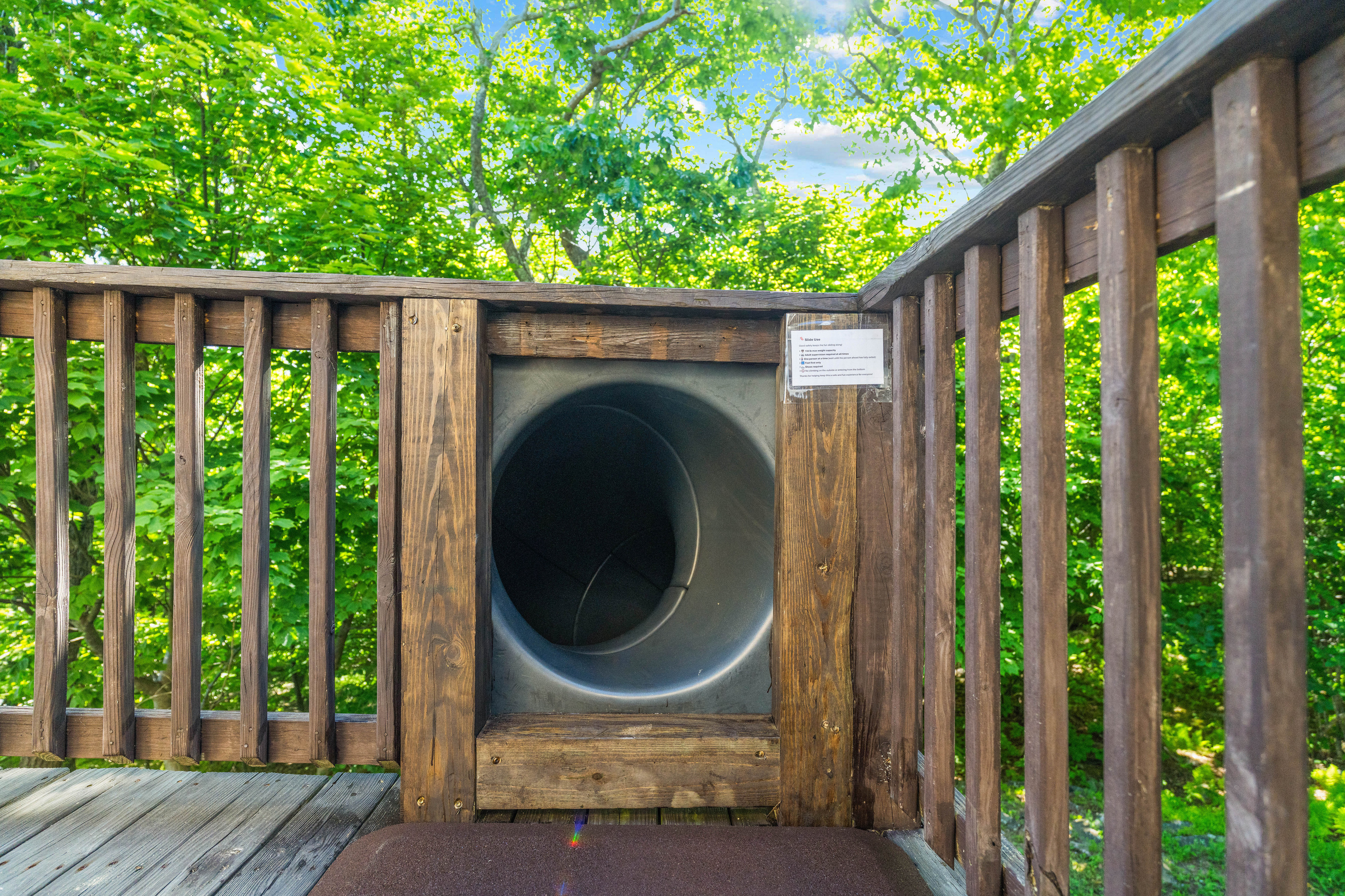 Just steps from the entrance, the spiral slide adds that instant kid-magnet moment — the kind of surprise that turns “nice house” into “can we come back here again?”