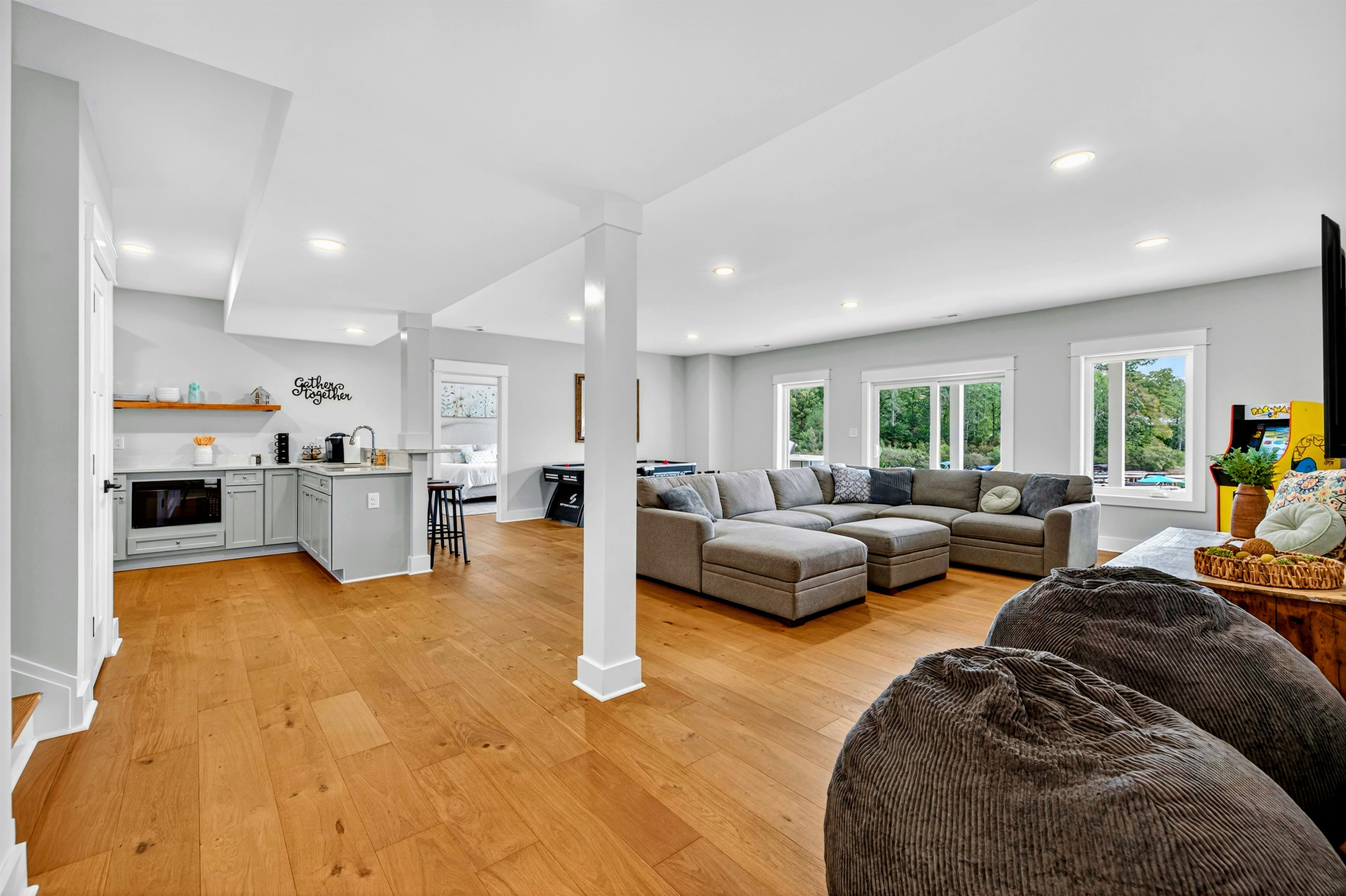 Amazing basement perfect for family's vacationing together w/ kitchen & coffee bar, and two kings and quad bunk room. Game room has it all: arcade game, shuffleboard, air hockey, ping-pong!