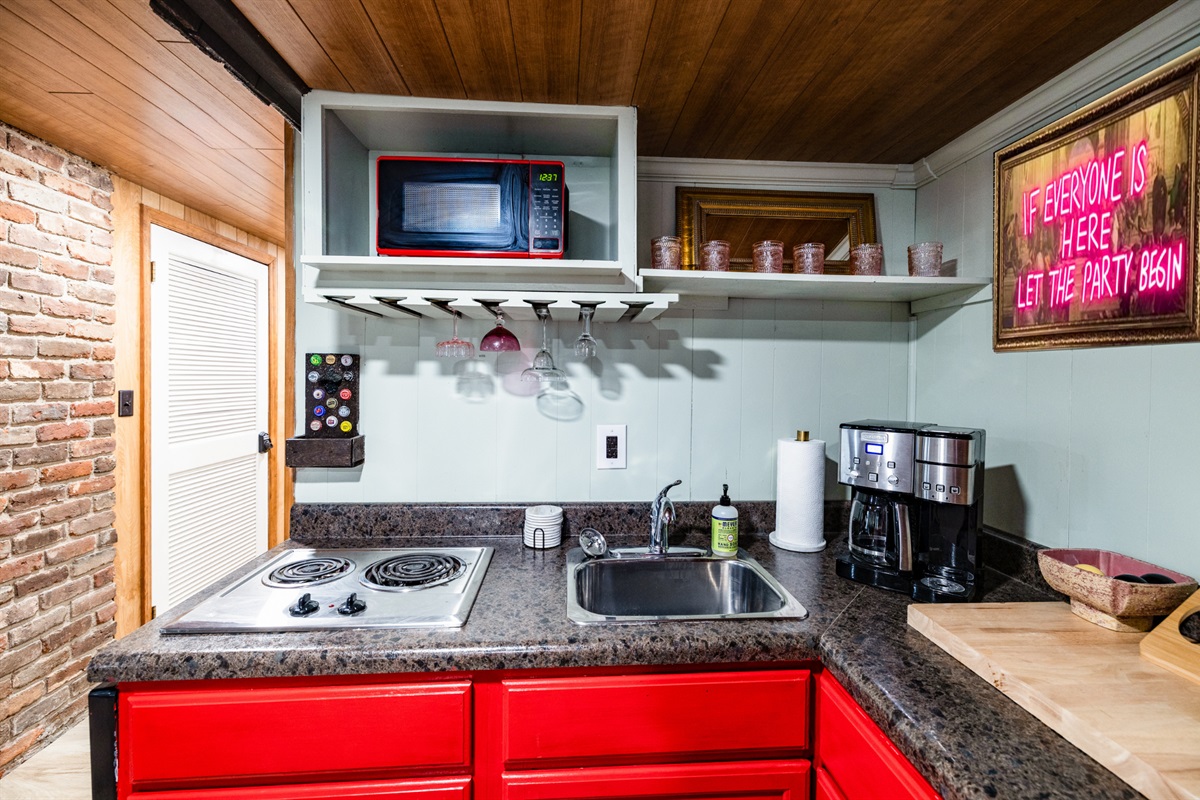 Perfectly situated next to an entertainment area, this space is ideal for preparing snacks and drinks while staying close to the fun and excitement.