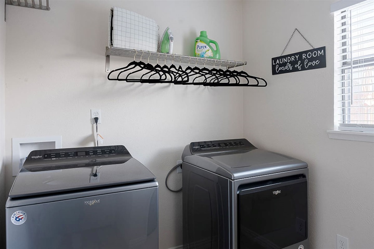 Delight in the complimentary laundry room for our guest, featuring a washer and dryer for your use during your stay