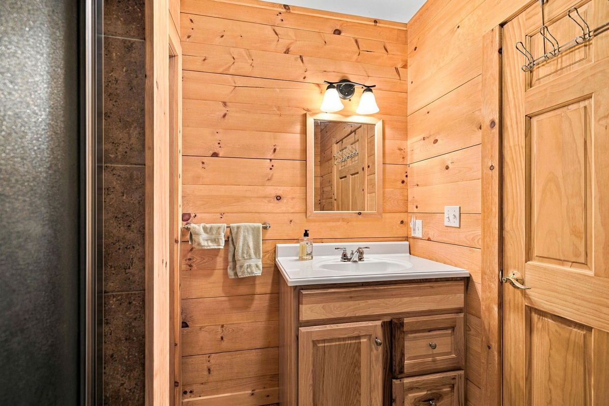 Convenient lower-level bathroom with a walk-in shower.