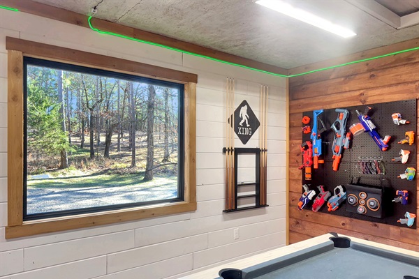 Game shed with view out to the driveway.