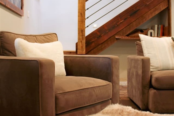Cozy seating and opens Staircase to Shred'n