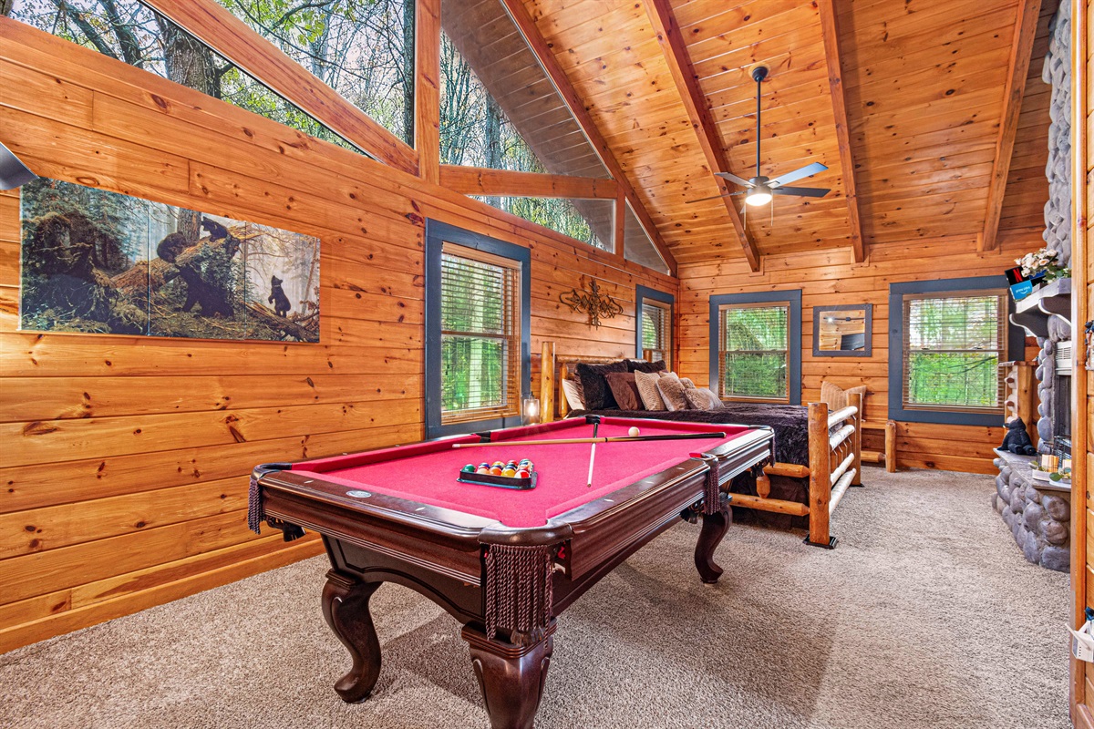 Huge en-suite king bedroom with pool table
