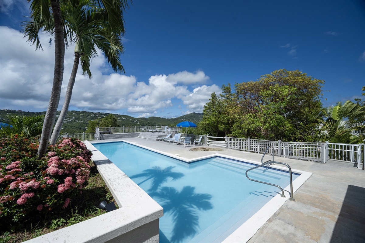 The expansive pool deck offers plenty of room to unwind.