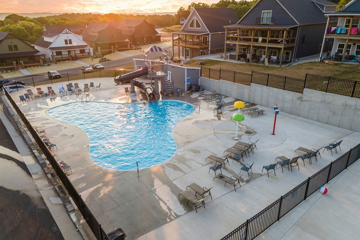 Jump in the community outdoor pool behind your home!