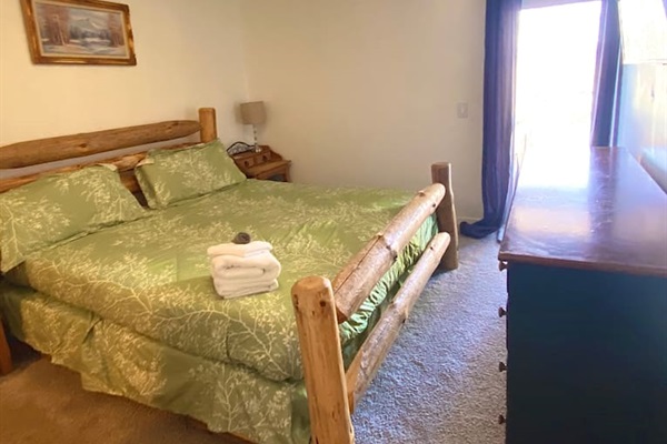 Bedroom 7, patio access, ensuite half bath